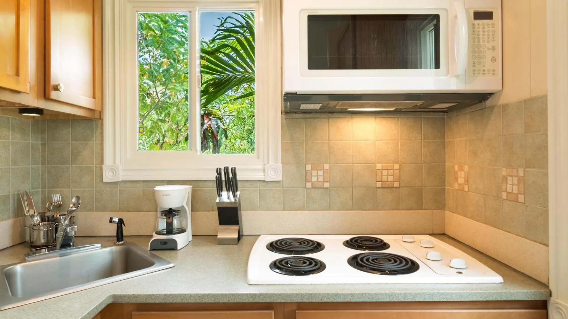 Kokomo Botanical Resort - Caribbean Family Cottages Turtle Cove
